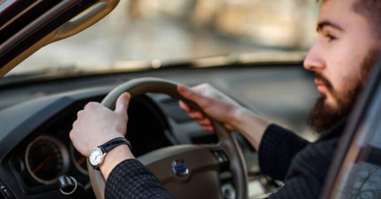 Man driving a car